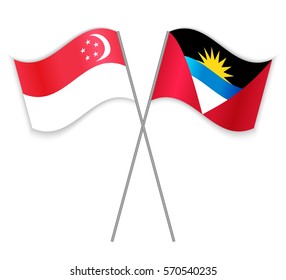 Singaporean and Antiguan crossed flags. Singapore combined with Antigua and Barbuda isolated on white. Language learning, international business or travel concept.