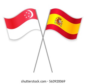 Singaporean and Spanish crossed flags. Singapore combined with Spain isolated on white. Language learning, international business or travel concept.