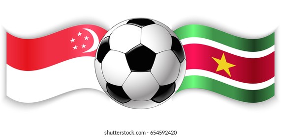 Singaporean and Surinamese wavy flags with football ball. Singapore combined with Suriname isolated on white. Football match or international sport competition concept.