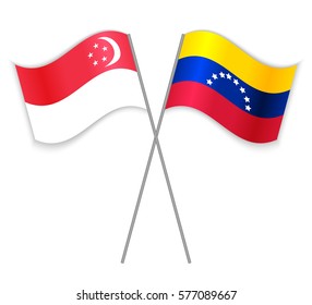 Singaporean and Venezuelan crossed flags. Singapore combined with Venezuela isolated on white. Language learning, international business or travel concept.