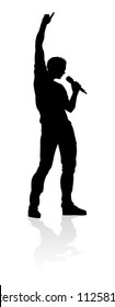 A Singer Pop, Country Music, Rock Star Or Hiphop Rapper Artist Vocalist Singing In Silhouette