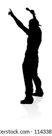 A singer pop, country music, rock star or hiphop rapper artist vocalist singing in silhouette