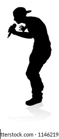 A singer pop, country music, rock star or hiphop rapper artist vocalist singing in silhouette