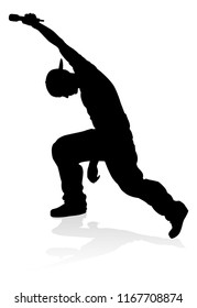 A singer pop, country music, rock star or hiphop rapper artist vocalist singing in silhouette