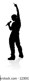 A Singer Pop, Country Music, Rock Star Or Hiphop Rapper Artist Vocalist Singing In Silhouette