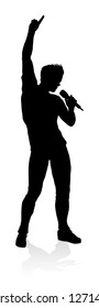 A singer pop, country music, rock star or hiphop rapper artist vocalist singing in silhouette