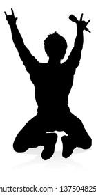 A singer pop, country music, rock star or hiphop rapper artist vocalist singing in silhouette