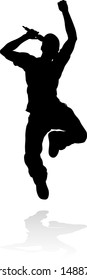 A singer pop, country music, rock star or hiphop rapper artist vocalist singing in silhouette