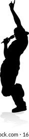 A singer pop, country music, rock star or hiphop rapper artist vocalist singing in silhouette