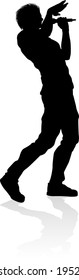 A singer pop, country music, rock star or hiphop rapper artist vocalist singing in silhouette
