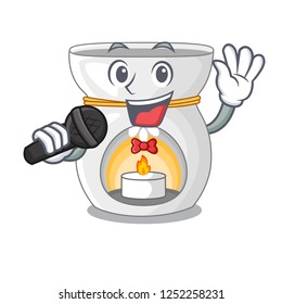 Singing aroma lamp with burning candle mascot