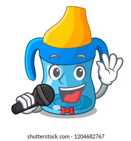 Singing cartoon baby drinking from training cup