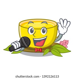 Singing turmeric tea in the cartoon shape