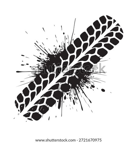 A single black tire track impression with splatters and detailed tread
