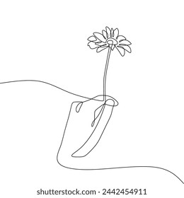 Una sola línea continua de arte de la mano sosteniendo una flor