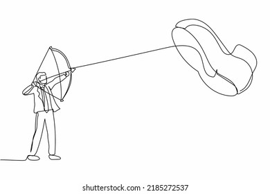 Single continuous line drawing active businessman aiming bow against giant shoes stomping. Office worker archering against giant foot step. Dynamic one line draw graphic design vector illustration