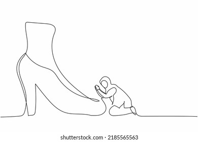 Single continuous line drawing active Arab businesswoman kneeling a giant foot or shoe. Female manager apologize to executive director. Minimalism metaphor. One line graphic design vector illustration