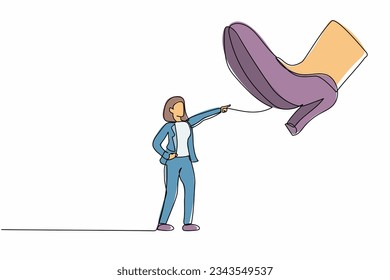 Single continuous line drawing active businesswoman facing against giant shoes stomping. Office worker pointing against giant foot step. Minimalism metaphor. One line draw design vector illustration