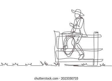 Single continuous line drawing American cowboy with lasso rope on wild west sunset landscape in the evening. Cowboy lifestyle in the stables. Dynamic one line draw graphic design vector illustration