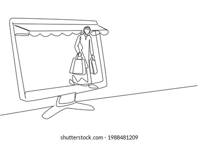 Single continuous line drawing Arab man coming out of canopy monitor screen holding shopping bags. Digital lifestyle and consumerism concept. Dynamic one line draw graphic design vector illustration