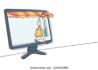 Single continuous line drawing Arab man coming out of canopy monitor screen holding shopping bags. Digital lifestyle and consumerism concept. Dynamic one line draw graphic design vector illustration