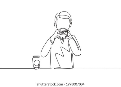 Single continuous line drawing Arabian boy having hamburger meal and hands around table  Enjoy   happy lunch when hungry  Delicious fast food  One line draw graphic design vector illustration