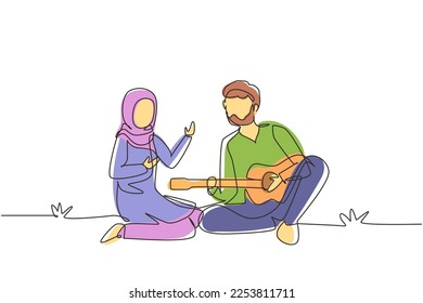 Single continuous line drawing Arabian couple of lovers has picnic on nature. Romantic man playing music on guitar, girl listen and singing together. One line draw graphic design vector illustration