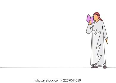 Single continuous line drawing Arabian guy standing and reads book that holds in one hand. Young man love to read. Male students with open books in hands. One line draw design vector illustration