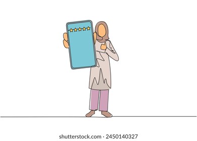 Single continuous line drawing Arabian woman standing holding smartphone showing screen to the front. Giving rating of 5 stars to online seller. Satisfied customer. One line design vector illustration