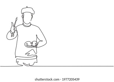 Single continuous line drawing artist painter with a thumbs-up gesture using painting tools such as brushes, canvas, and watercolors in producing art. One line draw graphic design vector illustration.