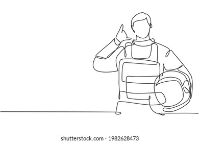Single continuous line drawing astronaut with call me gesture wearing spacesuits to explore outer space in search mysteries of universe. Great job. One line draw graphic design vector illustration