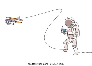 Single continuous line drawing of astronaut playing airplane radio control in moon surface. Having fun in leisure time on outer space concept. Trendy one line draw design vector illustration graphic