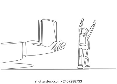 Single continuous line drawing the astronaut was excited to get a wallet from the giant hand. Simple. Concise. Made from smooth leather. Cosmonaut outer space. One line design vector illustration