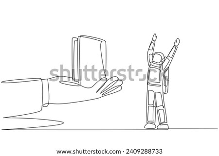 Single continuous line drawing the astronaut was excited to get a wallet from the giant hand. Simple. Concise. Made from smooth leather. Cosmonaut outer space. One line design vector illustration