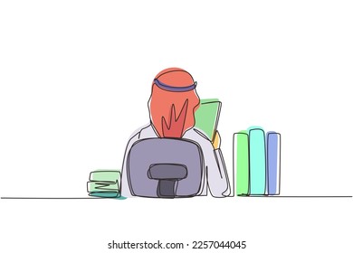 Single continuous line drawing back view of young Arabic man sitting at desk and reading book, student studying hard, preparing before exam with pile of books. One line draw design vector illustration