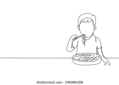 Single continuous line drawing boy having spaghetti meal with chopsticks around table. Enjoy lunch when hungry. Delicious and healthy food. Dynamic one line draw graphic design vector illustration