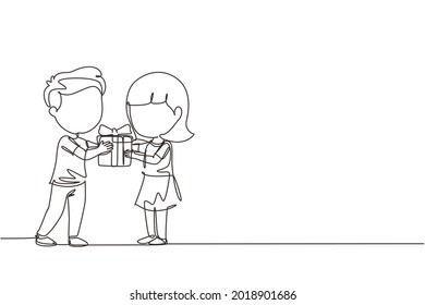 Single continuous line drawing boy kid giving girl birthday ribbon bow gift box. Children excited receiving gift from friend. Child hand over holiday present. One line draw graphic design vector