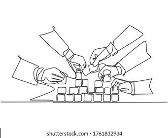 Single continuous line drawing of business team member arrange wooden cube block become sturdy tower together to improve team building. Teamwork concept one line draw design vector illustration