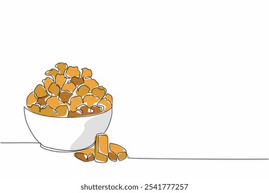 Single continuous line drawing caramel popcorn in white bowl with caramel pieces scattered around. Snacks eliminate hunger. Munchies. National Caramel Popcorn Day. One line design vector illustration