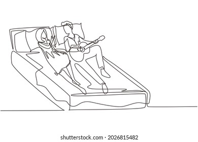 Single continuous line drawing couple spend free time at home, man plays guitar for woman lying on bed. Romantic guy singing songs for his wife in bedroom. One line graphic design vector illustration