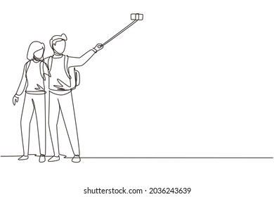 Single continuous line drawing couple tourist with backpack taking selfie over beautiful nature landscape background. Man and woman hiking nature trip. One line draw graphic design vector illustration