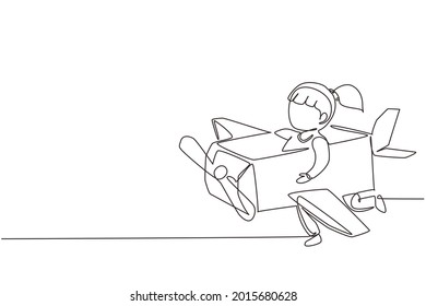 Single continuous line drawing creative girl playing as a pilot with cardboard airplane. Happy kids riding cardboard handmade airplane. Plane game. One line draw graphic design vector illustration
