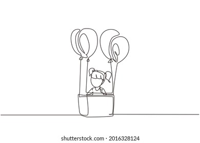 Single continuous line drawing cute girl sitting in cardboard box with balloons. Little pilot of hot air balloon. Creative kid character playing hot air balloon. One line draw graphic design vector