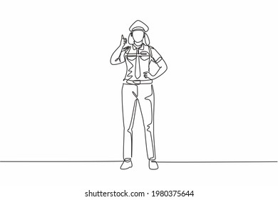 Single continuous line drawing female pilot stands with a thumbs-up gesture and uniform serves airplane passengers fly to their destination. Dynamic one line draw graphic design vector illustration.