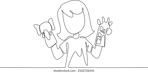 Single continuous line drawing girl playing elephant and giraffe hand puppets in both hands. Fiction story performance practice. Fable. National Day of Puppetry. One line design vector illustration