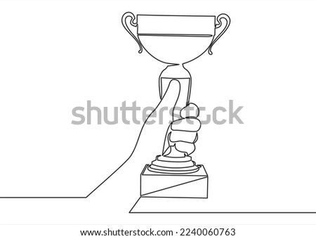 Single continuous line drawing gold trophy held by one hand. Symbol of winning championships, matches and sports competitions.