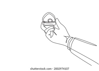 Single Continuous Line Drawing Hand Holding Box Wedding Ring. Groom's Gift For Bride On Their Special Day. Marriage Ceremony Celebration. Dynamic One Line Draw Graphic Design Vector Illustration