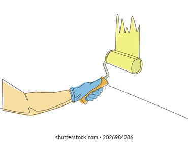 Single continuous line drawing of hand of handyman painting house wall with paint roller. Painter wall renovation service concept. One line draw design illustration