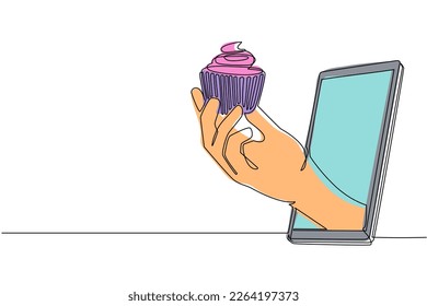 Single continuous line drawing hand holding cupcake through mobile phone. Concept of restaurant order delivery online food. Application for smartphone. one line draw graphic design vector illustration