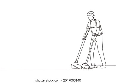 Single continuous line drawing housekeeping male worker with broom and dustpan. Young man janitor, sweeping the floor with broom, holding dustpan, professional cleaning. One line draw design vector